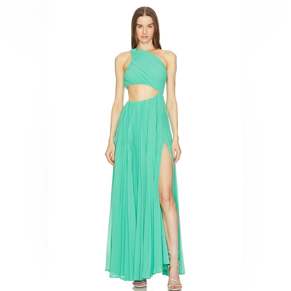 Jovie Gown in Aqua made by famous designer Michael Costello .